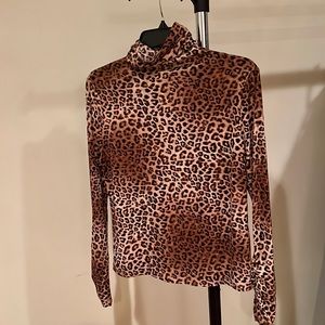 Leopard print turtleneck . Brand new!
